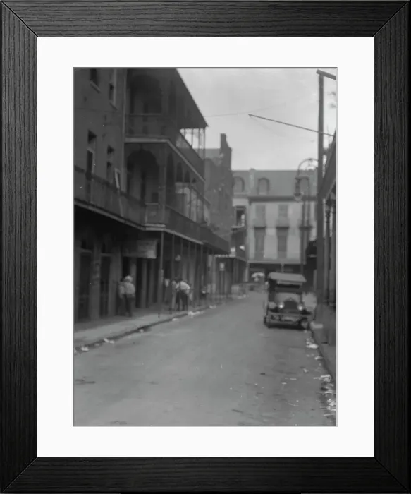 Framed Print : Street scene, New Orleans, between 1920 and 1926. Creator: Arnold Genthe Framed Print : Street scene, New Orleans, between 1920 and 1926. Creator: Arnold Genthe
