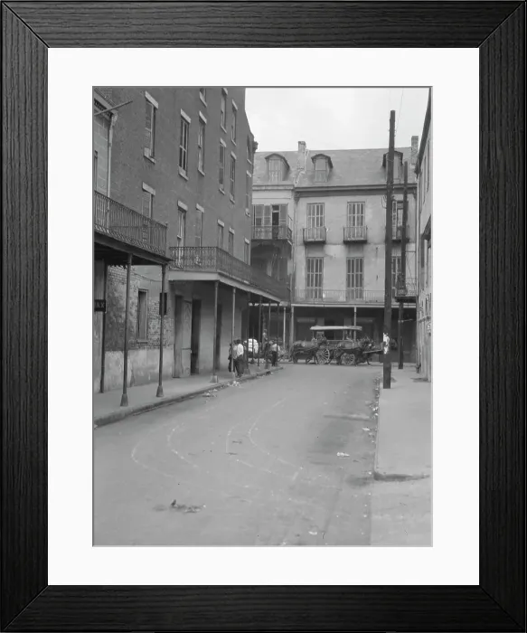 Framed Print : View down a street, New Orleans, between 1920 and 1926. Creator: Arnold Genthe Framed Print : View down a street, New Orleans, between 1920 and 1926. Creator: Arnold Genthe
