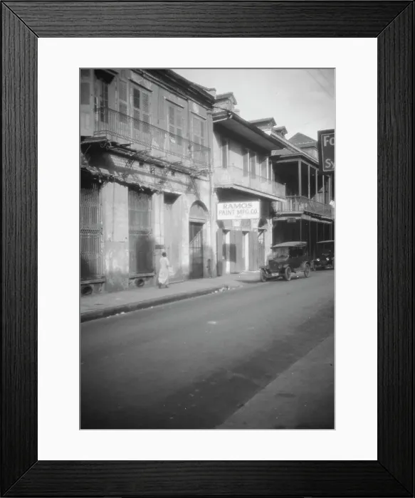 Framed Print : View down a street, New Orleans, between 1920 and 1926. Creator: Arnold Genthe Framed Print : View down a street, New Orleans, between 1920 and 1926. Creator: Arnold Genthe
