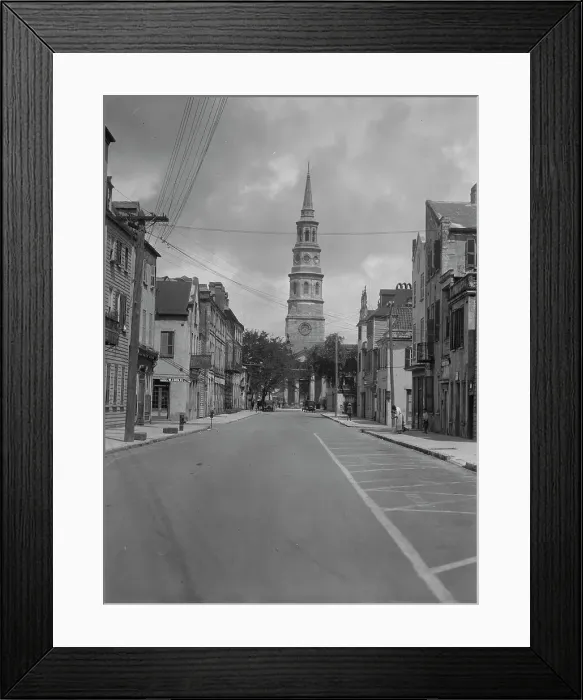 Framed Print : View down street to St. Philip's Church, Charleston, South Carolina, between 1920 and 1926. Creator: Arnold Genthe Framed Print : View down street to St. Philip's Church, Charleston, South Carolina, between 1920 and 1926. Creator: Arnold Genthe