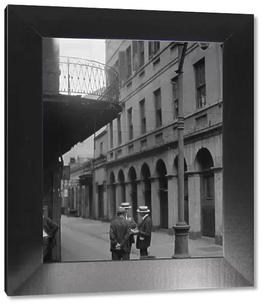 Exchange Alley, New Orleans, between 1920 and 1926. Creator: Arnold Genthe