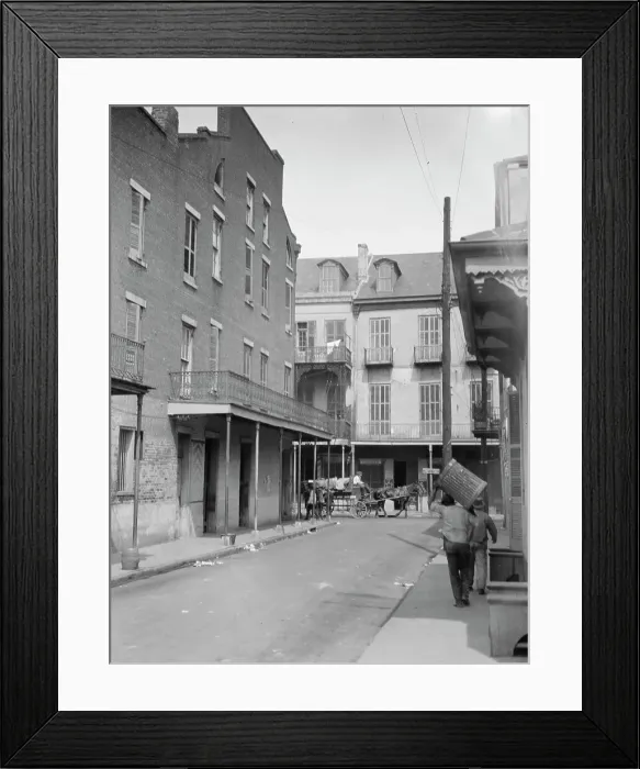 Framed Print : View down a street, New Orleans, between 1920 and 1926. Creator: Arnold Genthe Framed Print : View down a street, New Orleans, between 1920 and 1926. Creator: Arnold Genthe