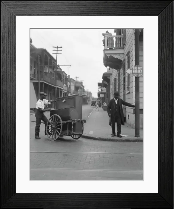 Framed Print : Organ grinder, New Orleans, between 1920 and 1926. Creator: Arnold Genthe Framed Print : Organ grinder, New Orleans, between 1920 and 1926. Creator: Arnold Genthe