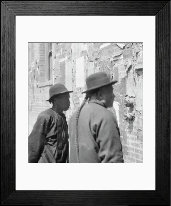 Framed Print : Reading wall notices, Chinatown, San Francisco, between 1896 and 1906. Creator: Arnold Genthe Framed Print : Reading wall notices, Chinatown, San Francisco, between 1896 and 1906. Creator: Arnold Genthe