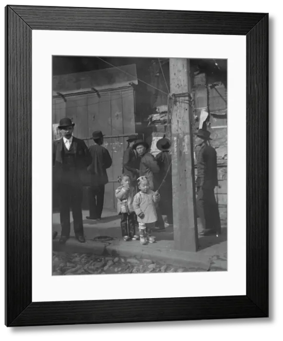Framed Print : A holiday, Chinatown, San Francisco, between 1896 and 1906. Creator: Arnold Genthe Framed Print : A holiday, Chinatown, San Francisco, between 1896 and 1906. Creator: Arnold Genthe