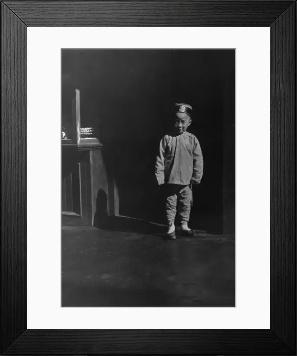 Framed Print : Boy in doorway of lamp store, Chinatown, San Francisco, between 1896 and 1906. Creator: Arnold Genthe Framed Print : Boy in doorway of lamp store, Chinatown, San Francisco, between 1896 and 1906. Creator: Arnold Genthe