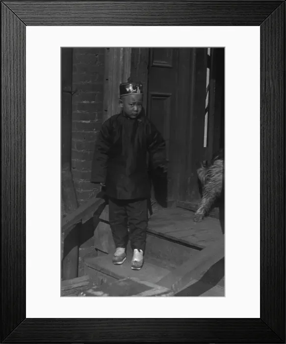 Framed Print : Boy standing on steps in front of a doorway, Chinatown, San Francisco, between 1896 and 1906. Creator: Arnold Genthe Framed Print : Boy standing on steps in front of a doorway, Chinatown, San Francisco, between 1896 and 1906. Creator: Arnold Genthe