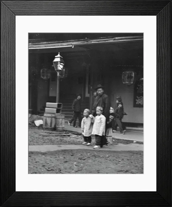 Framed Print : Man and two children crossing a street, Chinatown, San Francisco, between 1896 and 1906. Creator: Arnold Genthe Framed Print : Man and two children crossing a street, Chinatown, San Francisco, between 1896 and 1906. Creator: Arnold Genthe