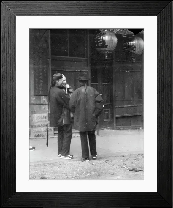 Framed Print : Two men, one holding a child, standing in the street, Chinatown, San Francisco, c1896-1906. Creator: Arnold Genthe Framed Print : Two men, one holding a child, standing in the street, Chinatown, San Francisco, c1896-1906. Creator: Arnold Genthe