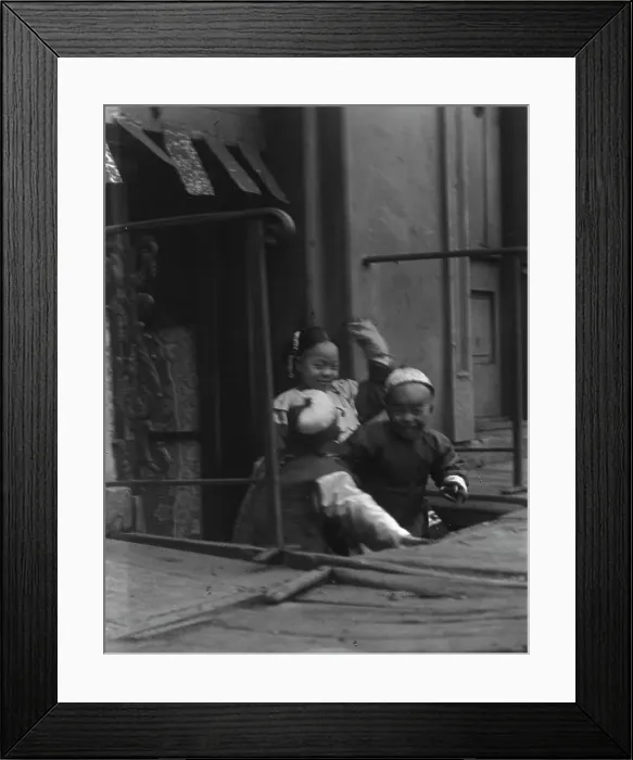 Framed Print : Three children in front of a cellar door, Chinatown, San Francisco, between 1896 and 1906. Creator: Arnold Genthe Framed Print : Three children in front of a cellar door, Chinatown, San Francisco, between 1896 and 1906. Creator: Arnold Genthe
