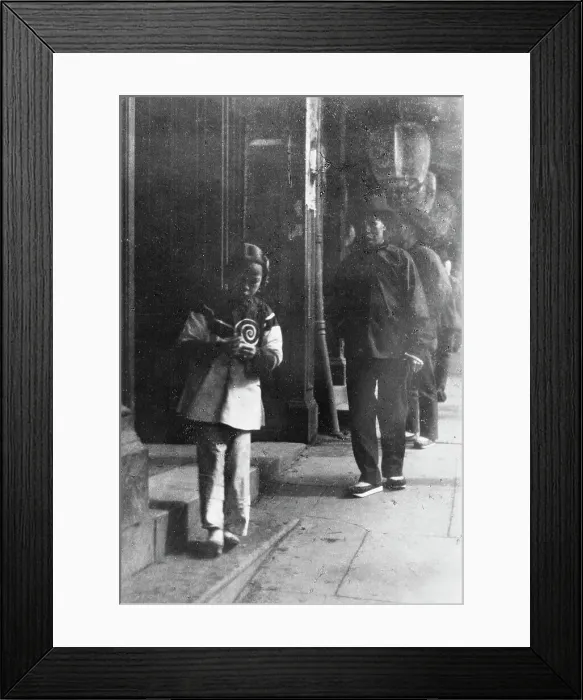 Framed Print : Young girl walking down a street, Chinatown, San Francisco, between 1896 and 1906. Creator: Arnold Genthe Framed Print : Young girl walking down a street, Chinatown, San Francisco, between 1896 and 1906. Creator: Arnold Genthe