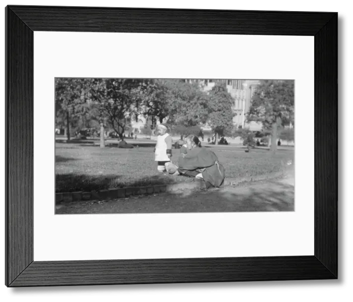 Framed Print : A picnic on Portsmouth Square, Chinatown, San Francisco, between 1896 and 1906. Creator: Arnold Genthe Framed Print : A picnic on Portsmouth Square, Chinatown, San Francisco, between 1896 and 1906. Creator: Arnold Genthe
