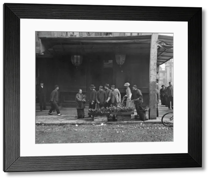 Framed Print : The lily vendor, Chinatown, San Francisco, between 1896 and 1906. Creator: Arnold Genthe Framed Print : The lily vendor, Chinatown, San Francisco, between 1896 and 1906. Creator: Arnold Genthe
