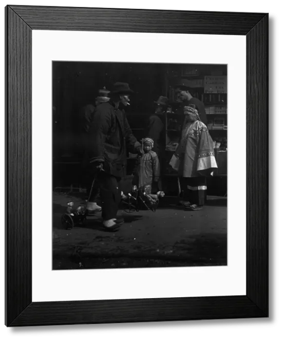 Framed Print : The toy peddler, Chinatown, San Francisco, between 1896 and 1906. Creator: Arnold Genthe Framed Print : The toy peddler, Chinatown, San Francisco, between 1896 and 1906. Creator: Arnold Genthe