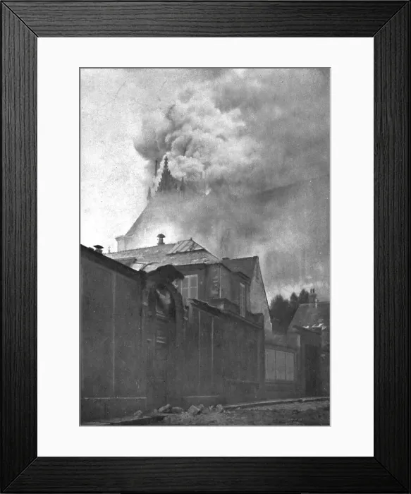 Framed Print : Le Cathedrale de Reims en flammes; Le clocher a l'Ange et la toiture du chevet en feu, 1914. Creator: T Holden Waterhouse
