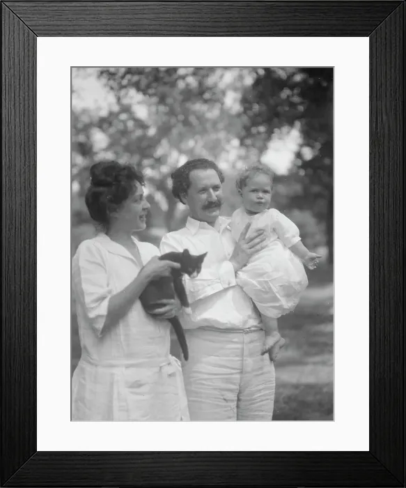 Framed Print : Nadelman, Mr. and Mrs. with baby and cat, standing outdoors, 1923 July 12. Creator: Arnold Genthe Framed Print : Nadelman, Mr. and Mrs. with baby and cat, standing outdoors, 1923 July 12. Creator: Arnold Genthe