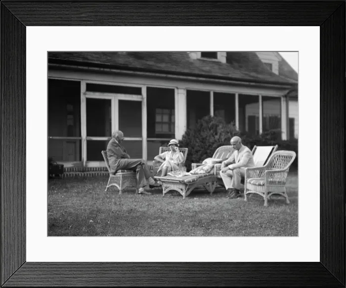 Framed Print : Sexton, Mr. and Mrs. and an unidentified man, seated outdoors, between 1932 and 1936. Creator: Arnold Genthe Framed Print : Sexton, Mr. and Mrs. and an unidentified man, seated outdoors, between 1932 and 1936. Creator: Arnold Genthe