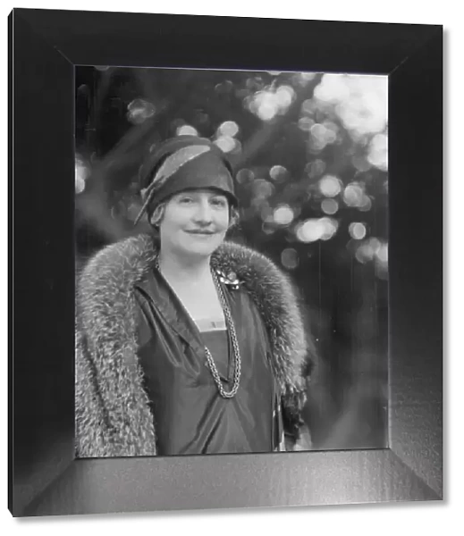 Alanson, Bertram, Mrs. standing outdoors, between 1927 and 1937. Creator: Arnold Genthe