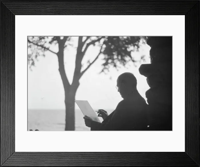 Framed Print : Bruce, Ned, Mr. reading and writing outdoors, 1915? Creator: Arnold Genthe Framed Print : Bruce, Ned, Mr. reading and writing outdoors, 1915? Creator: Arnold Genthe