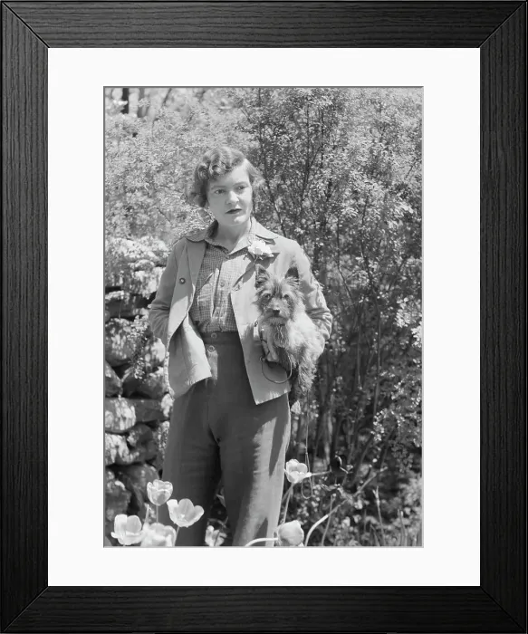 Framed Print : DeLamar, Alice, Miss, with dog, standing outdoors, between 1927 and 1942. Creator: Arnold Genthe Framed Print : DeLamar, Alice, Miss, with dog, standing outdoors, between 1927 and 1942. Creator: Arnold Genthe