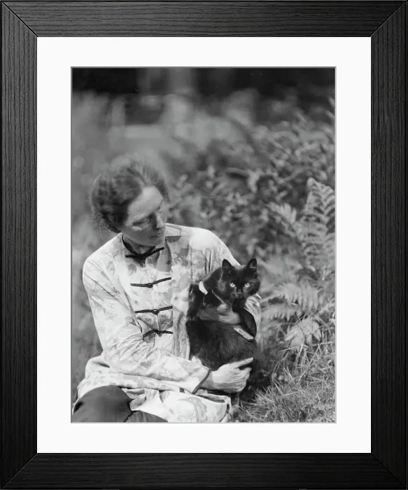 Framed Print : Egger, Gabrielle, Miss, friend of, with cat, seated outdoors, between 1926 and 1930. Creator: Arnold Genthe Framed Print : Egger, Gabrielle, Miss, friend of, with cat, seated outdoors, between 1926 and 1930. Creator: Arnold Genthe