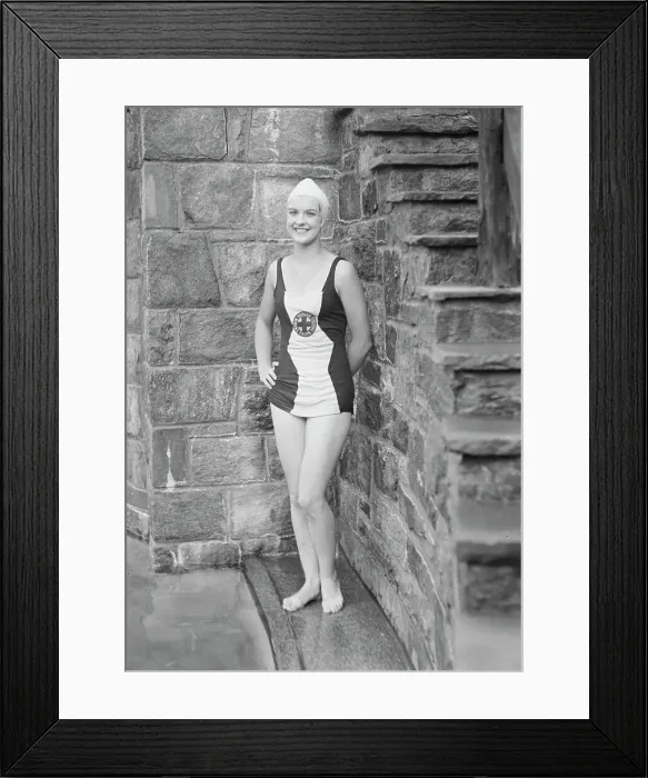 Framed Print : Ford, Elsie, Miss, standing outdoors in a bathing suit, 1932 July. Creator: Arnold Genthe