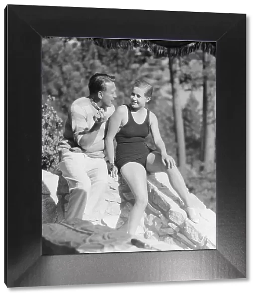Lee, Margaret, Miss, and unidentified man, seated outdoors, 1927 Creator: Arnold Genthe