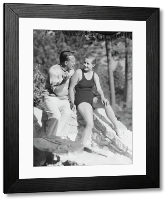 Framed Print : Lee, Margaret, Miss, and unidentified man, seated outdoors, 1927 Creator: Arnold Genthe Framed Print : Lee, Margaret, Miss, and unidentified man, seated outdoors, 1927 Creator: Arnold Genthe
