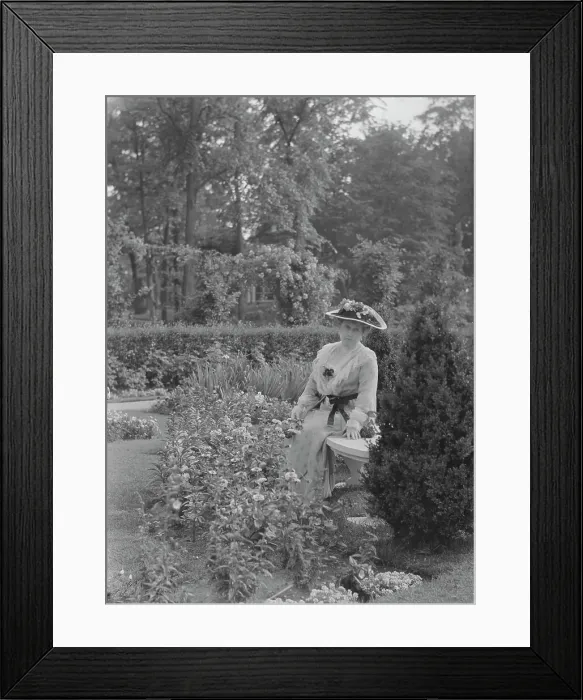 Framed Print : Truesdale, W. Mrs. standing in a garden, 1915 July 6. Creator: Arnold Genthe Framed Print : Truesdale, W. Mrs. standing in a garden, 1915 July 6. Creator: Arnold Genthe