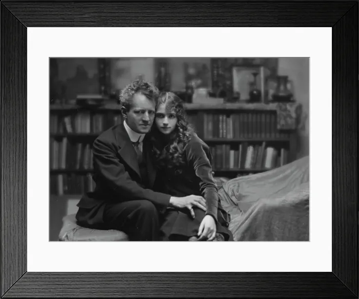 Framed Print : Arnold Genthe seated next to a woman friend in his studio in San Francisco, between 1896 and 1911. Creator: Arnold Genthe Framed Print : Arnold Genthe seated next to a woman friend in his studio in San Francisco, between 1896 and 1911. Creator: Arnold Genthe