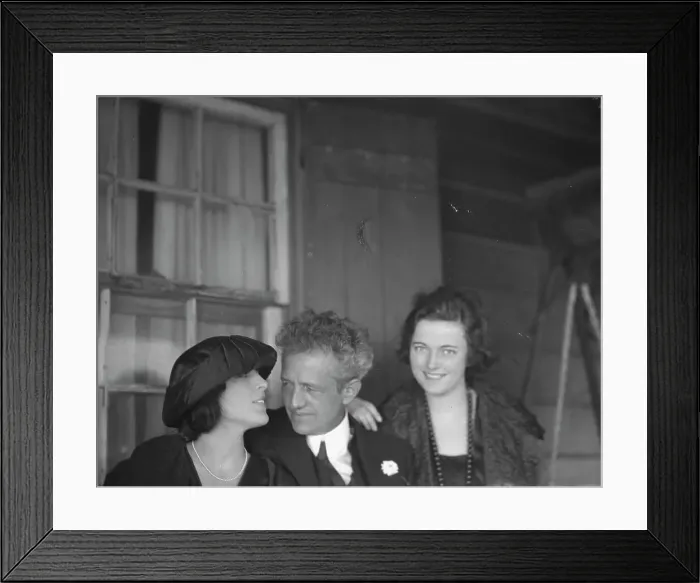 Framed Print : Arnold Genthe with two women friends on the porch of his bungalow in Long Beach, N.Y. c1911-c1942. Creator: Arnold Genthe Framed Print : Arnold Genthe with two women friends on the porch of his bungalow in Long Beach, N.Y. c1911-c1942. Creator: Arnold Genthe