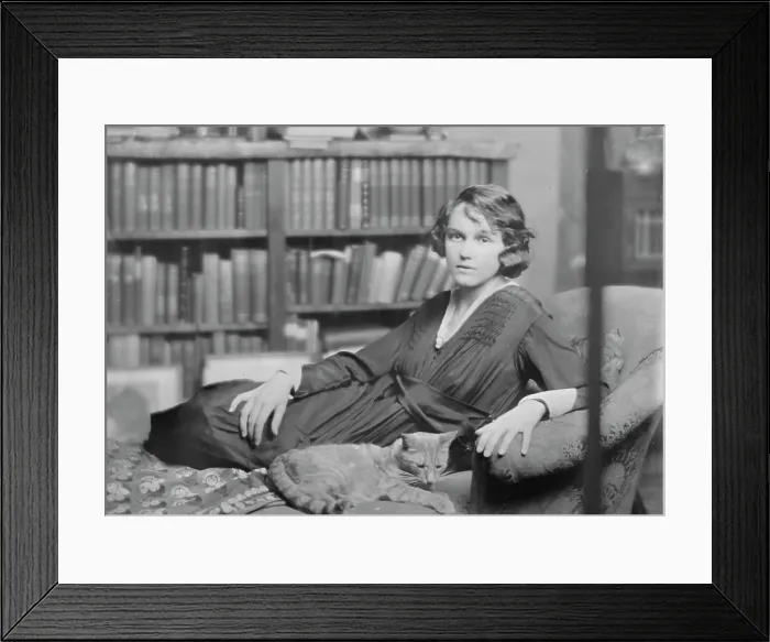 Framed Print : Miss Helen Chamberlain, with Buzzer the cat, portrait photograph, 1918 May 28. Creator: Arnold Genthe