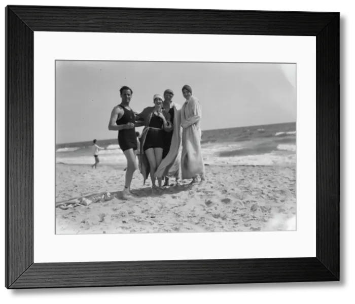 Framed Print : Group of people at Long Beach, New York, between 1896 and 1942. Creator: Arnold Genthe Framed Print : Group of people at Long Beach, New York, between 1896 and 1942. Creator: Arnold Genthe