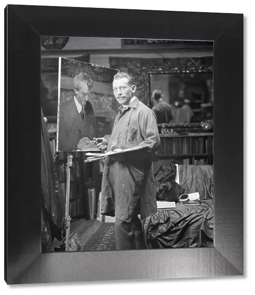 J.M. Williamson painting a portrait of Arnold Genthe, 1915. Creator: Arnold Genthe