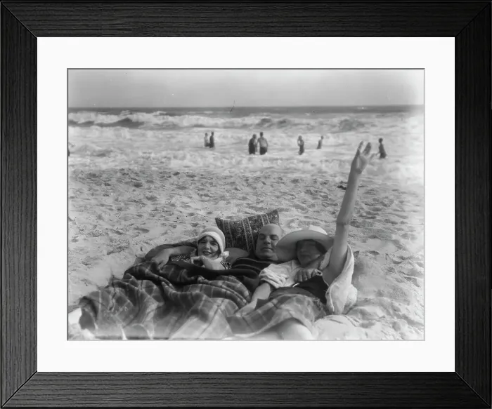 Framed Print : Unidentified man and two women at Long Beach, New York, between 1911 and 1942. Creator: Arnold Genthe Framed Print : Unidentified man and two women at Long Beach, New York, between 1911 and 1942. Creator: Arnold Genthe