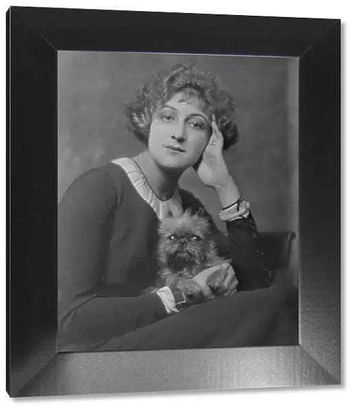 Melville, Mrs. with dog, portrait photograph, not before 1916. Creator: Arnold Genthe