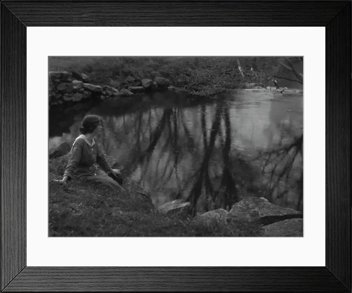 Framed Print : Millay, Edna St. Vincent, Miss, seated next to a pond, 1914. Creator: Arnold Genthe Framed Print : Millay, Edna St. Vincent, Miss, seated next to a pond, 1914. Creator: Arnold Genthe