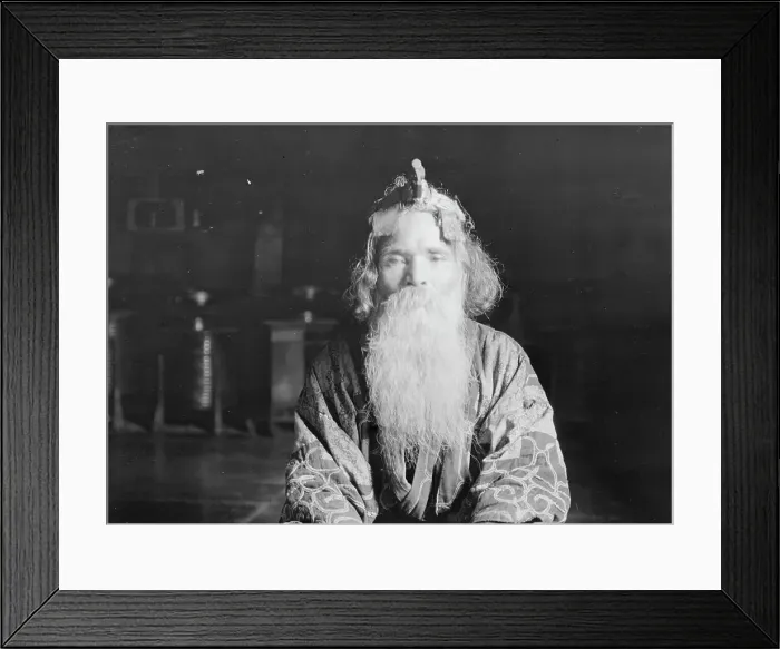 Framed Print : Ainu chief wearing a headdress, 1908. Creator: Arnold Genthe Framed Print : Ainu chief wearing a headdress, 1908. Creator: Arnold Genthe