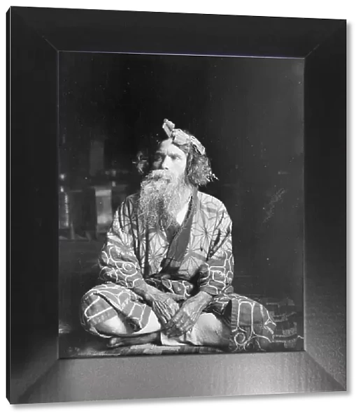 Ainu chief wearing a headdress, 1908. Creator: Arnold Genthe