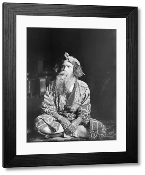 Framed Print : Ainu chief wearing a headdress, 1908. Creator: Arnold Genthe Framed Print : Ainu chief wearing a headdress, 1908. Creator: Arnold Genthe