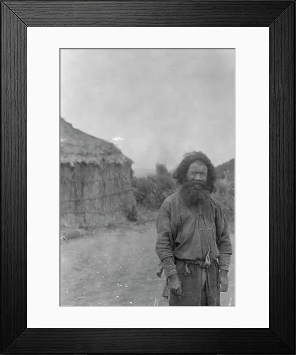 Framed Print : Ainu man standing outside, 1908. Creator: Arnold Genthe Framed Print : Ainu man standing outside, 1908. Creator: Arnold Genthe