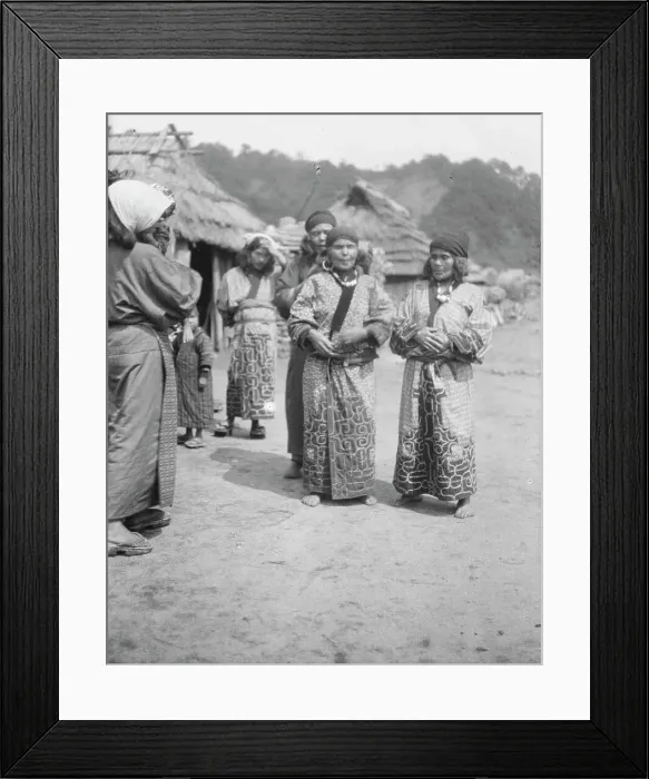 Framed Print : Ainu woman outside in the village lane, 1908. Creator: Arnold Genthe Framed Print : Ainu woman outside in the village lane, 1908. Creator: Arnold Genthe