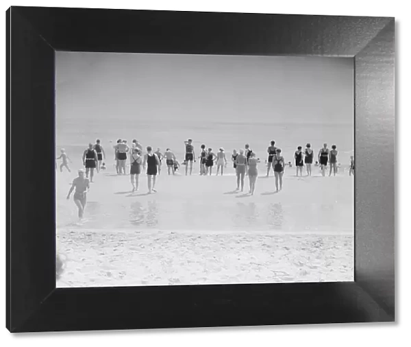 Beach scene, East Hampton, Long Island, between 1933 and 1942. Creator: Arnold Genthe
