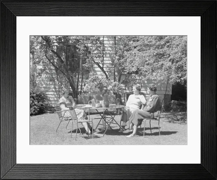 Framed Print : Mrs. Mary Benson and two identified women seated outdoors at a table, between 1933 and 1942. Creator: Arnold Genthe Framed Print : Mrs. Mary Benson and two identified women seated outdoors at a table, between 1933 and 1942. Creator: Arnold Genthe