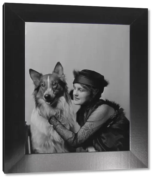Phillips, Norma, Miss, with dog, portrait photograph, 1914 Nov. 28. Creator: Arnold Genthe