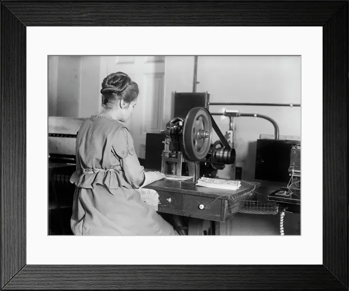 Framed Print : Seal of The United States - Stamping Bonds, 1917. Creator: Harris & Ewing. Seal of The United States - Stamping Bonds, 1917. Creator: Harris & Ewing Framed Print : Seal of The United States - Stamping Bonds, 1917. Creator: Harris & Ewing. Seal of The United States - Stamping Bonds, 1917. Creator: Harris & Ewing