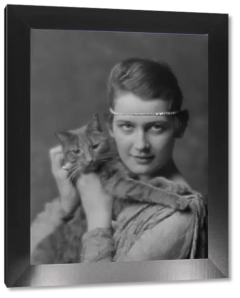 Holch, Anna, Miss, with Buzzer the cat, portrait photograph, ca. 1913. Creator: Arnold Genthe