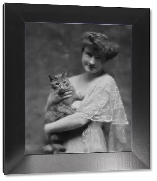 King, G. Miss, with Buzzer the cat, portrait photograph, 1914 May 12. Creator: Arnold Genthe