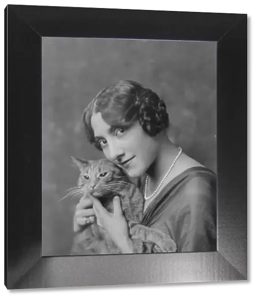 Liebert, M. Miss, with Buzzer the cat, portrait photograph, between 1916 and 1927. Creator: Arnold Genthe