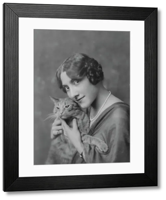 Framed Print : Liebert, M. Miss, with Buzzer the cat, portrait photograph, between 1916 and 1927. Creator: Arnold Genthe Framed Print : Liebert, M. Miss, with Buzzer the cat, portrait photograph, between 1916 and 1927. Creator: Arnold Genthe